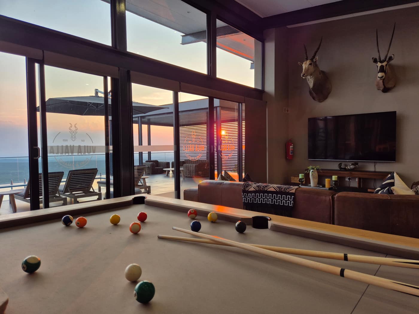 Iketla entertainment area with pool table